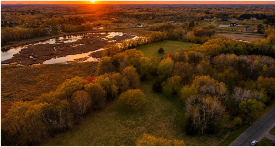 Aerial view of the Friday Farms property in Ham Lake at sunset